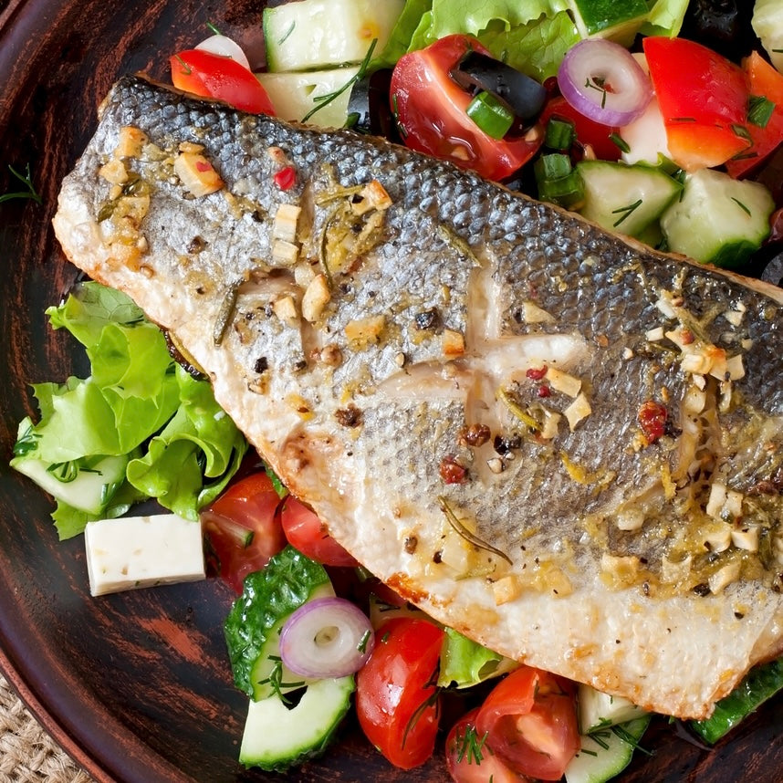 Cooked Sea bass Fillets on salad from Tom the Fish
