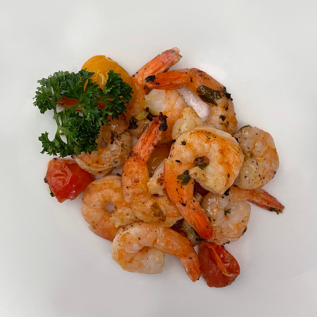Cooked King Prawns with herb and tomato dressing